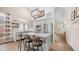 Well-lit kitchen with stainless appliances, a large island, and stylish bar stools at 3521 N Barron --, Mesa, AZ 85207