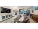 Inviting living room featuring a cozy fireplace, stylish furniture, and natural light, creating a warm atmosphere at 3521 N Barron --, Mesa, AZ 85207
