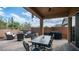 Spacious outdoor patio with comfortable seating, dining area, and lush greenery perfect for entertaining at 3521 N Barron --, Mesa, AZ 85207