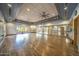 Spacious dance studio with wood floors, mirrors, and ballet barres, bathed in natural light at 3521 N Barron --, Mesa, AZ 85207