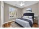 Stylish main bedroom features a luxurious bed, shutters and decor for a relaxing atmosphere at 3565 E Meadowview Dr, Gilbert, AZ 85298