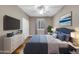 Tastefully decorated main bedroom featuring a luxurious bed, shutters and decor for a relaxing atmosphere at 3565 E Meadowview Dr, Gilbert, AZ 85298