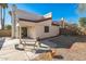 Backyard featuring concrete patio, mature trees, and potential for landscaping at 4024 E Hiddenview Dr, Phoenix, AZ 85048