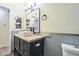 Bathroom with stylish vanity, framed mirror, modern fixtures, and contemporary design at 4024 E Hiddenview Dr, Phoenix, AZ 85048