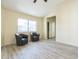 Bright living room features vaulted ceiling, updated flooring and large windows at 4024 E Hiddenview Dr, Phoenix, AZ 85048