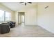 Living room featuring vaulted ceilings, wood-look floors, neutral paint and accent chairs at 4024 E Hiddenview Dr, Phoenix, AZ 85048