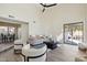 Bright living room with modern furnishings and a sliding door to the backyard at 4024 E Hiddenview Dr, Phoenix, AZ 85048