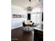 Stylish dining room boasting modern chandelier and natural light at 4213 W Villa Linda Dr, Glendale, AZ 85310