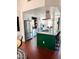 Spacious kitchen featuring stainless steel appliances and a green island at 4213 W Villa Linda Dr, Glendale, AZ 85310