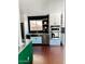 Modern kitchen featuring stainless steel appliances and sleek white cabinetry at 4213 W Villa Linda Dr, Glendale, AZ 85310