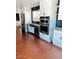 Bright kitchen featuring stainless steel appliances and white cabinetry at 4213 W Villa Linda Dr, Glendale, AZ 85310