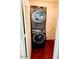 Convenient laundry space featuring stacked washer and dryer at 4213 W Villa Linda Dr, Glendale, AZ 85310