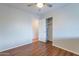 Simple bedroom with laminate flooring and closet at 425 S 93Rd Pl, Mesa, AZ 85208