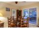 Cozy dining area with a round wooden table, chairs, and a view of the inviting backyard patio at 4431 N 21St Pl, Phoenix, AZ 85016