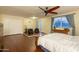 Large primary bedroom with hardwood floors, ceiling fan and sitting area with bonus lighting at 4431 N 21St Pl, Phoenix, AZ 85016