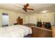 Large primary bedroom featuring hardwood floors, a walk-in closet, and ensuite bathroom at 4431 N 21St Pl, Phoenix, AZ 85016