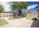Paver patio in backyard with turf and desert landscaping at 4512 W Rushmore Dr, Anthem, AZ 85087