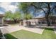 Paver patio in backyard with turf and desert landscaping at 4512 W Rushmore Dr, Anthem, AZ 85087