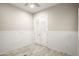 Bright room with smooth walls, fan, and glass french doors at 4512 W Rushmore Dr, Anthem, AZ 85087