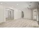 Spacious living room with open layout, tile floors, recessed lighting and neutral paint scheme at 4512 W Rushmore Dr, Anthem, AZ 85087
