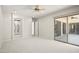 Relaxing main bedroom with a ceiling fan, and sliding doors providing access to the backyard patio at 4512 W Rushmore Dr, Anthem, AZ 85087