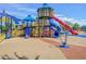 A sprawling playground with varied equipment ensures an active and fun experience for children of all ages in a community at 4512 W Rushmore Dr, Anthem, AZ 85087