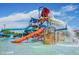 A vibrant community water park with slides, play structures, and refreshing water features, offering endless summer fun for families at 4512 W Rushmore Dr, Anthem, AZ 85087