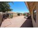 Expansive low maintenance backyard with covered patio area at 4558 E Libby St, Phoenix, AZ 85032