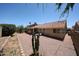 Extensive backyard, complete with covered patio, providing private relaxation space at 4558 E Libby St, Phoenix, AZ 85032