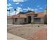 Single-story home with desert landscaping, tile roof, and inviting curb appeal at 4558 E Libby St, Phoenix, AZ 85032