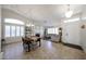 Inviting living room featuring a fireplace, dining area, and tiled floor at 4558 E Libby St, Phoenix, AZ 85032