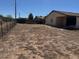 Spacious, partially landscaped backyard with a chain link fence at 5122 E Shadow Ln, San Tan Valley, AZ 85140