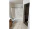 Bathroom with a shower-tub combo, tile flooring, and a wooden vanity at 5122 E Shadow Ln, San Tan Valley, AZ 85140