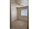 Bedroom includes a window and ceiling fan at 5122 E Shadow Ln, San Tan Valley, AZ 85140