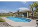 Fenced backyard pool with sun-drenched pool and blue sky, creating a peaceful oasis at 5330 E Tierra Buena Ln, Scottsdale, AZ 85254