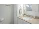 Bright bathroom with granite vanity, fresh white cabinets, and modern fixtures at 5330 E Tierra Buena Ln, Scottsdale, AZ 85254