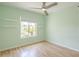 Cozy bedroom with plenty of natural light from the large window at 5330 E Tierra Buena Ln, Scottsdale, AZ 85254
