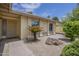 Inviting front entrance with desert landscaping, walkway and security door at 5330 E Tierra Buena Ln, Scottsdale, AZ 85254
