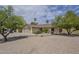 Charming single story home featuring desert landscaping, mature trees and a two car garage at 5330 E Tierra Buena Ln, Scottsdale, AZ 85254