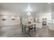 Open concept living room into kitchen featuring polished concrete floors and open design at 5330 E Tierra Buena Ln, Scottsdale, AZ 85254