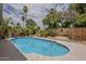 Private backyard pool surrounded by lush landscaping, offering a serene and refreshing outdoor retreat at 5330 E Tierra Buena Ln, Scottsdale, AZ 85254