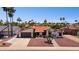 Charming single-story home with desert landscaping, tile roof, and a spacious driveway at 5415 E Juniper Ave, Scottsdale, AZ 85254