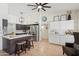 Spacious kitchen and seating area with stainless steel appliances, island, and open design at 5415 E Juniper Ave, Scottsdale, AZ 85254