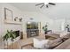 Bright living room with a tiled fireplace, high ceilings, and comfortable seating at 5415 E Juniper Ave, Scottsdale, AZ 85254