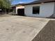 Spacious driveway leading to backyard with a privacy gate at 5539 W Wilshire Dr, Phoenix, AZ 85035