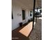 Inviting front porch with decorative plants, leading to the main entrance of the home at 5539 W Wilshire Dr, Phoenix, AZ 85035