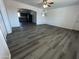 Open floor plan view from the living room leading into the modern kitchen space at 5539 W Wilshire Dr, Phoenix, AZ 85035