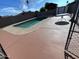 Backyard pool with diving board, concrete patio and privacy fence, great for outdoor entertainment at 5539 W Wilshire Dr, Phoenix, AZ 85035