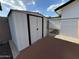 Backyard featuring a shed for extra storage and a chain link fence, offering convenience and security at 5539 W Wilshire Dr, Phoenix, AZ 85035