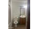 Simple bathroom with a toilet, sink, and standard fixtures at 6226 W Citrus Way, Glendale, AZ 85301